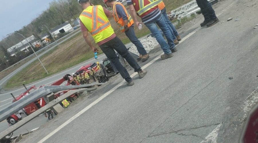 Miraculously no injuries after transport truck topples from overpass
