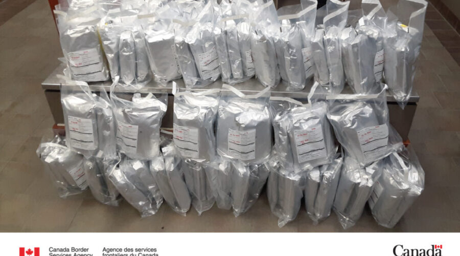 Two face charges after 140lbs of cannabis seized at airport