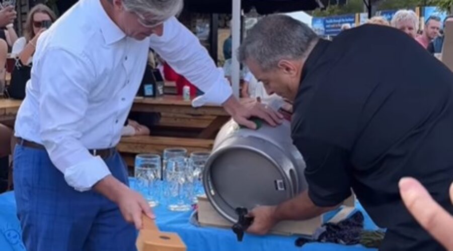 Premier Tim Houston Taps Keg At Oktoberfest Celebration